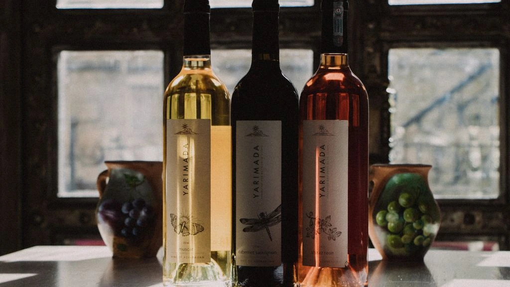 Bottles of estate Cabernet Sauvignon on a concrete surface